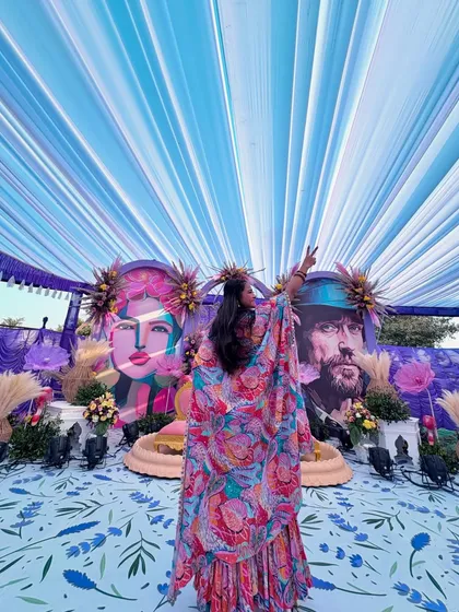 A creative angle from the back, looking up at the colorful tent. This artistic shot highlights the outfit and the festive atmosphere.