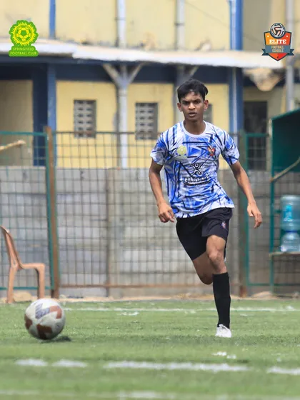 Running with purpose. This image captures the speed and determination of our players during a match.