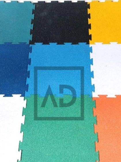 A selection of my interlocking gym and play area tiles. They come in various colors, allowing for custom designs and designated workout zones.