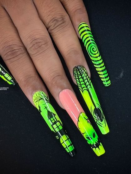 Another angle of the Halloween nail art, highlighting the spooky skull and haunted house.