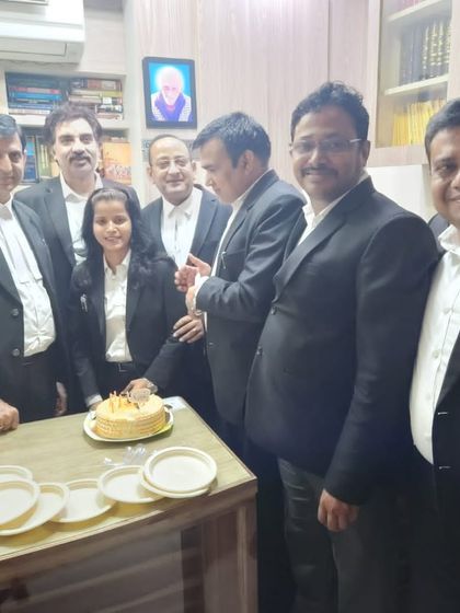 The team celebrating together. Success in criminal law practice is often a collective effort.