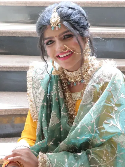 The joy of a bride on her special day. Our goal is to make every client feel this happy and confident.