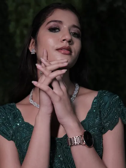 A flawless makeup base is key for any special occasion. This look features a subtle glam eye and a perfectly blended base, ensuring she looks stunning all night long.