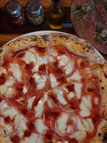 A closer look at the Goan Sausage pizza. The way the sausage crisps up in the oven is just perfect.