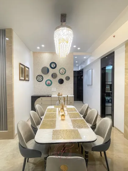 A long shot of the dining table, emphasizing its length and capacity for hosting large gatherings. The elegant lighting and decor make it a perfect setting for celebrations.