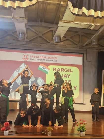 A dramatic tableau performed by students during the Kargil Vijay Diwas tribute. We use performing arts to convey powerful stories of courage and sacrifice, making history relatable for our students.