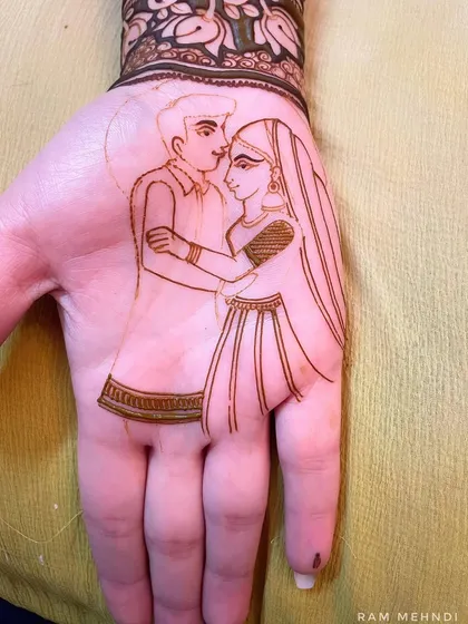 The outline of a romantic couple's portrait. The simple lines capture the intimacy of the pose.