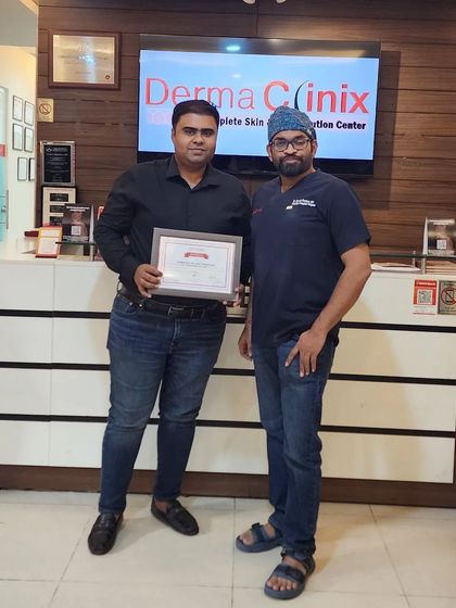Another photo celebrating Dr. Akash's successful completion of his fellowship training at Dermaclinix.