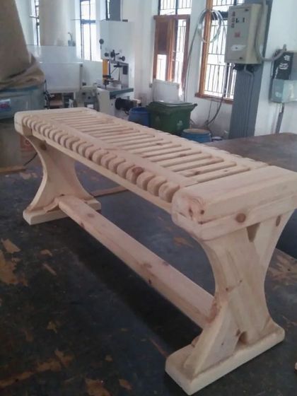 The fully assembled bench, fresh from the clamps and before the final sanding and finishing. The raw construction showcases the accuracy of the joinery and the success of the assembly process.