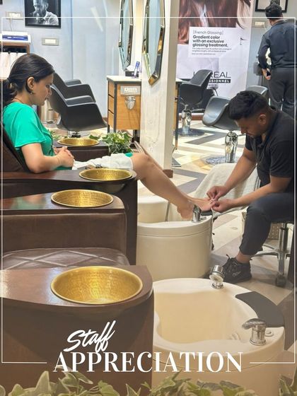 A candid shot of my team at work. I am so grateful for their hard work and artistry. They are the hands that create beauty and confidence for our clients every day.