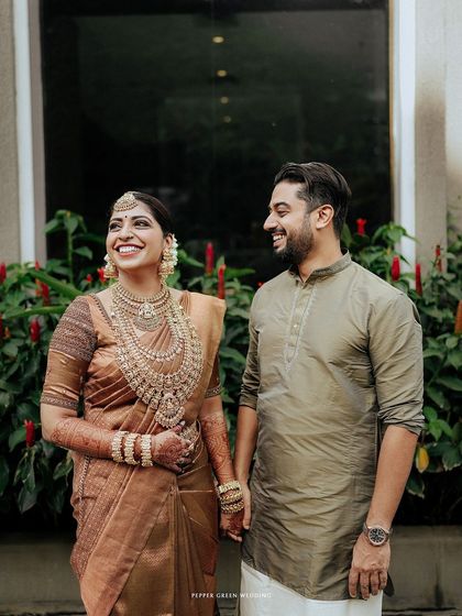 A happy portrait of the couple, their smiles and easy interaction showcasing their love.