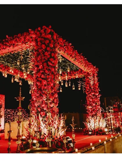 For a client who wanted a bold and romantic wedding, we designed this breathtaking all-red floral mandap. It was a captivating and passionate setting for the vows.