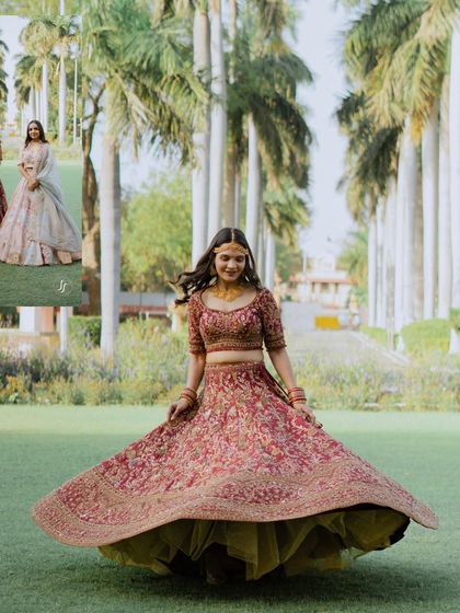 A full-length shot of the bride twirling in her beautiful embroidered lehenga.
