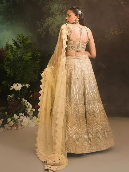 From the first twirl to the final glance, the Jade Lehenga Set is designed to make you shine brighter than any star, perfect for a grand wedding entrance.