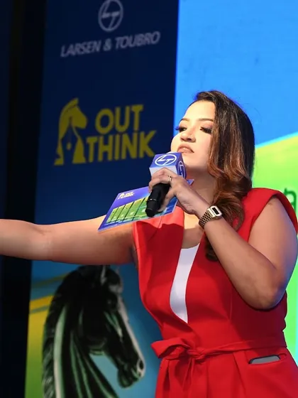 A close-up shot of me engaging with the audience during the L&T event.