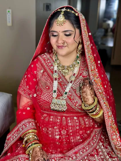 Another angle of this regal bride. The makeup was carefully layered to ensure it looked stunning from every viewpoint, highlighting her features without feeling heavy.
