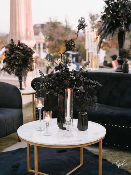 For this chic monochrome sangeet, we created moody lounge areas with black velvet sofas and dramatic black floral arrangements. The look was sophisticated, modern, and effortlessly glamorous.