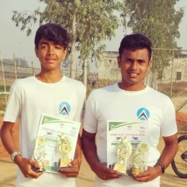 Shreyas and Subhash after winning the Doubles title of an Under 18 Championship Series tournament.