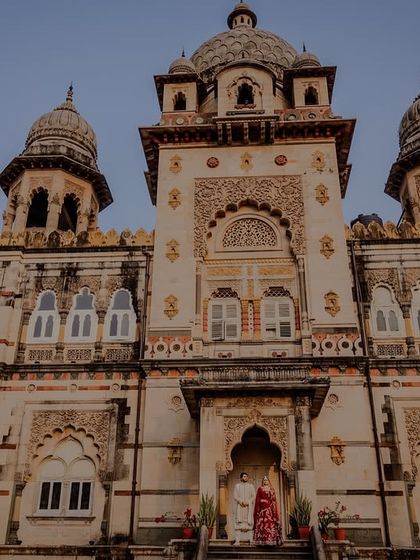An even wider shot of the palace, showing the sheer scale of the destination wedding venue.