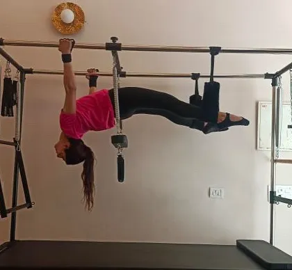 Another advanced move on the Cadillac. This kind of work builds incredible upper body and core strength.