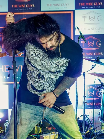 Our frontman, Keyoor, giving it his all. Every performance is a piece of his heart, and that authenticity connects with everyone in the room.