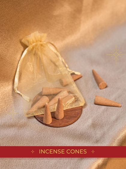 A small organza bag filled with fragrant incense cones, another thoughtful item from our budget-friendly "Festive Bundle".