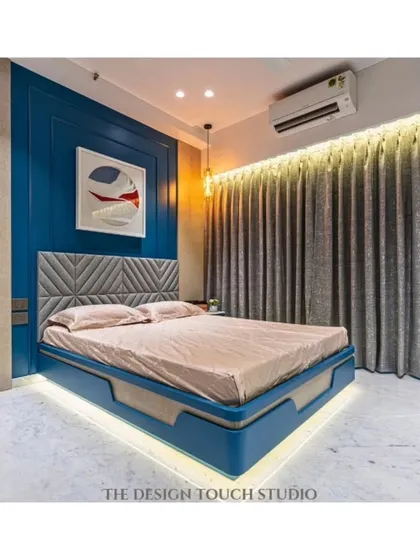 This shot captures the floating bed with its ambient underlighting, creating a sophisticated and dreamy atmosphere. The geometric headboard adds another layer of texture and style.