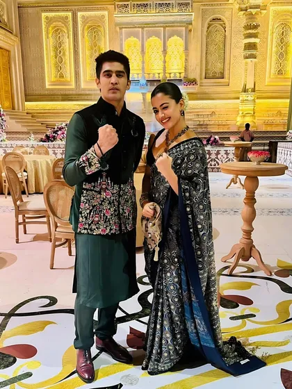 For the Ambani-Merchant wedding celebrations, I designed this velvet green Jawahar jacket for Vijender Singh. The piece features intricate floral hand-embroidery on the cuffs and chest, paired with a matching silk kurta.