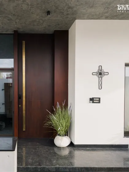 This is the 10-foot custom handle I created, seen on the main entrance of a modern home. The clean lines and warm brass finish provide a stunning contrast against the dark wood panels and minimalist facade, proving that grand scale can also be sleek and contemporary.