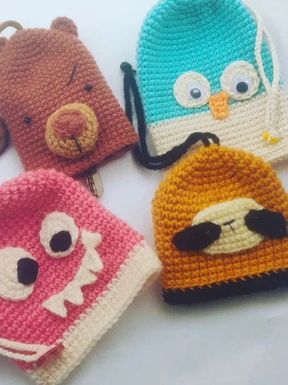 Add a little fun to your daily essentials with these quirky character key covers. From a sleepy sloth to a grumpy bear, these handmade accessories not only protect your keys but also make them easy to find in your bag. I can also customize them to be your favorite character.