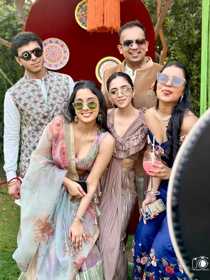 The whole squad looking fabulous! Our booth is perfect for group shots, ensuring no one is left out of the fun memories.