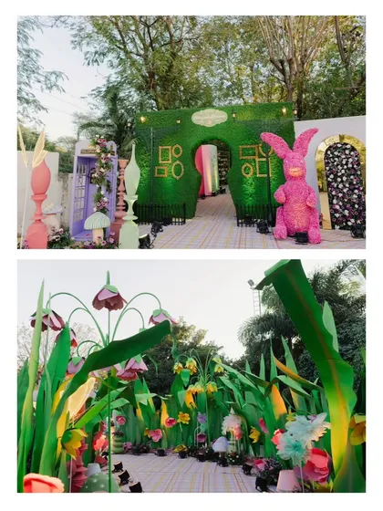 A glimpse into the magical entrance of the Wonderland-themed Mehndi. A giant pink floral rabbit and a keyhole-shaped doorway invited guests into a world of fantasy and celebration.