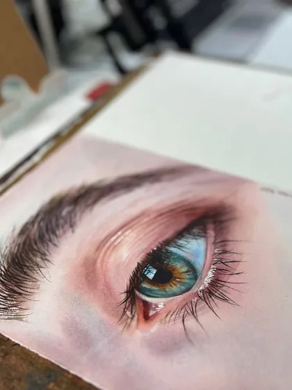 The eye is the window to the soul, and painting one in hyper-realism is a lesson in patience. This close-up from a workshop demonstration shows how layering watercolor washes can create depth, reflection, and life.