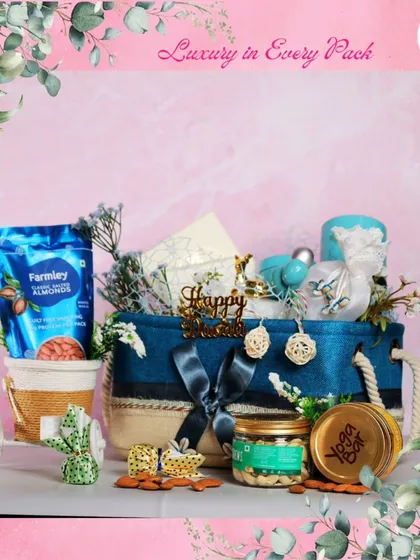 Luxury in every pack. This birthday hamper, with its blue and beige theme, includes healthy snacks like almonds from Farmley and a Yoga Bar, perfect for a health-conscious recipient.
