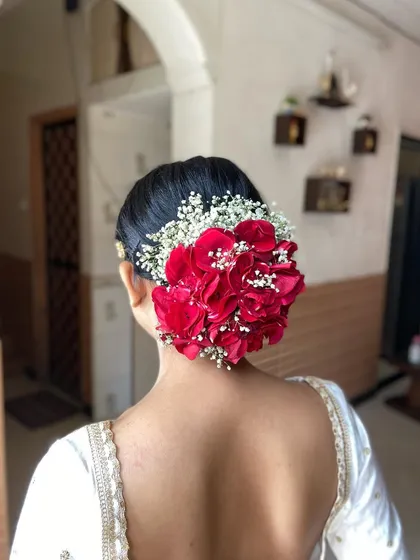 The full back view of the classic bridal bun. This is a timeless look that never goes out of style.