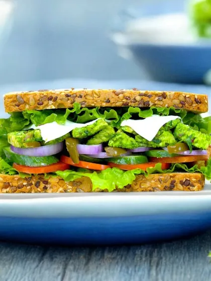 For meat lovers, we have the Tossed Chicken Sarson Da Saag Sandwich. It's a hearty and flavourful sandwich that's perfect for a winter celebration like Lohri.
