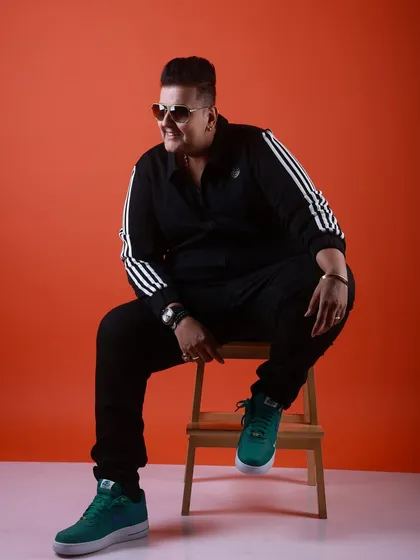 Who says DJs can't model? A fun shot from a professional photoshoot, showing off my style and personality.