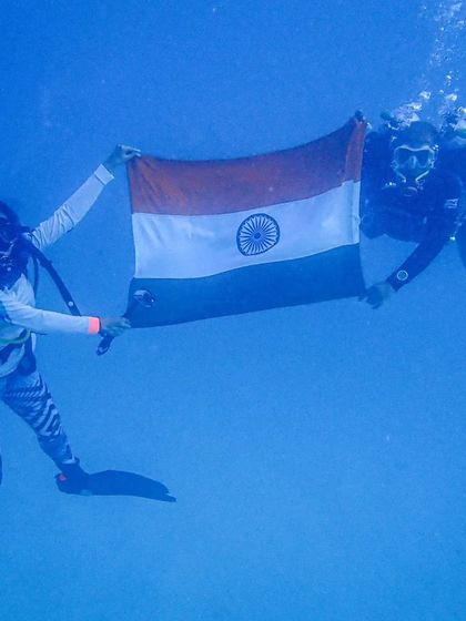 Celebrating India's 75th Independence Day the best way we know how. Two of our divers proudly hold the tricolor underwater.