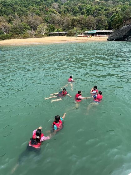 A refreshing swim in the turquoise waters of the Arabian Sea is a must-do on our summer trips to Gokarna.