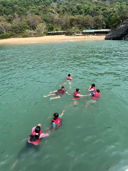 A refreshing swim in the turquoise waters of the Arabian Sea is a must-do on our summer trips to Gokarna.