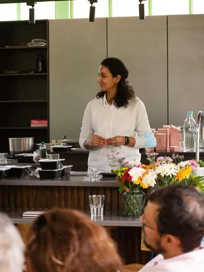 An instructor from Manam Chocolate addressing the group during our workshop. We partner with leaders in the culinary world to bring you authentic and deeply knowledgeable sessions on everything from cacao to cheese.