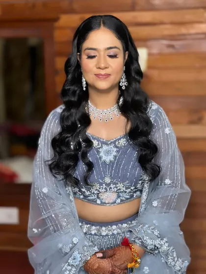 Khushi's sangeet makeup, designed to be pretty, polished, and dance-proof.