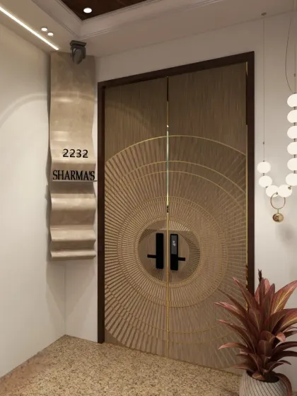 The entrance sets the tone for the entire home. For this Noida penthouse, I designed a stunning carved main door with intricate metal profiles and a custom flare-pattern nameplate to make a grand and sophisticated first impression.