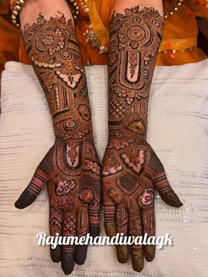 A very heavy and intricate design that covers the entire hand with complex patterns. The dark stain shows the quality of my henna.
