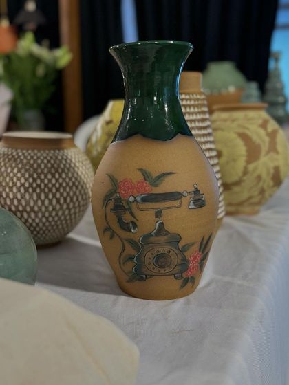 A few of my favorite finished vases from a recent collection, featuring a variety of glazes, painted details, and forms. Each one has its own personality.