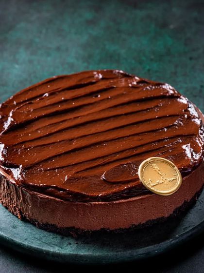 Our Belgian Dark Chocolate Mousse cake has a soft, creamy texture and a rich dark chocolate taste. It's topped with our signature ganache for an extra velvety finish.