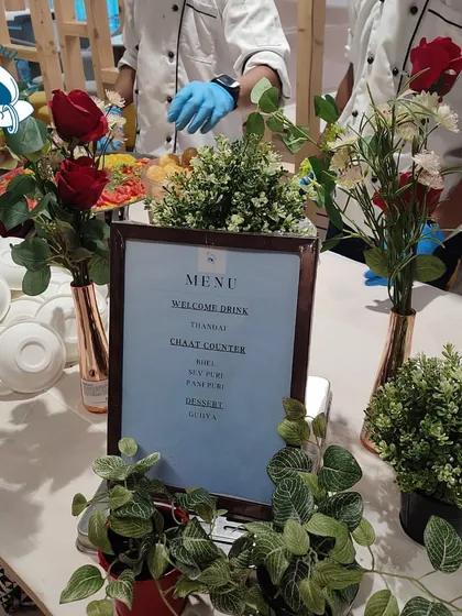 The menu display for the Holi catering event at Kult App. I work with clients to create a balanced menu that fits the occasion, including welcome drinks, interactive counters, and desserts.