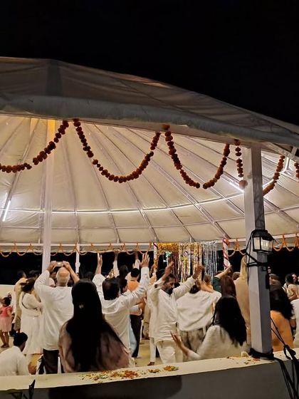 Our yoga shala at night, decorated for a celebration. It is a magical space for practice, kirtan, and community gatherings.