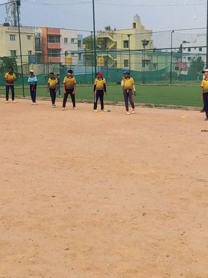 Fielding practice on a turf wicket. We provide our players with experience on different surfaces to prepare them for all conditions.