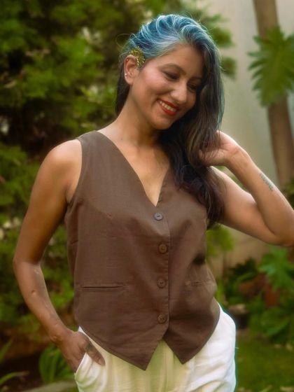 A close-up of the summer look, showing the beautiful texture of the handloom waistcoat.